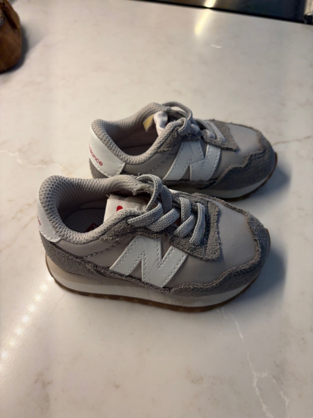 New Balance Kids' 237 Bungee Shoes in the Marblehead/Moonbeam colorway size 5